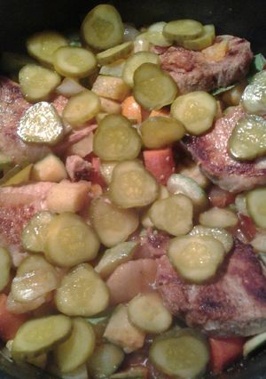 A picture of Porc mariné dans du jus de cornichon.