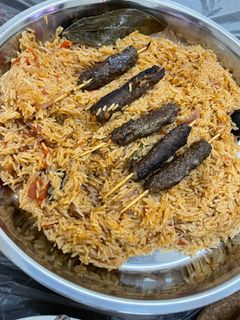 صورة لوصفة رز بالطماطم على طريقة حماتي