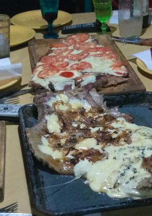 Una foto de Festival de matambre pizaiola asado a la parrilla