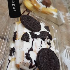 A picture of Waffles with whipped cream topping.