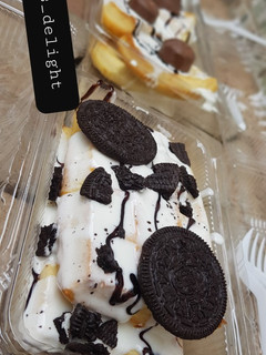 A picture of Waffles with whipped cream topping.