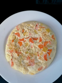 Una foto de Tortilla de zanahoria y calabacín