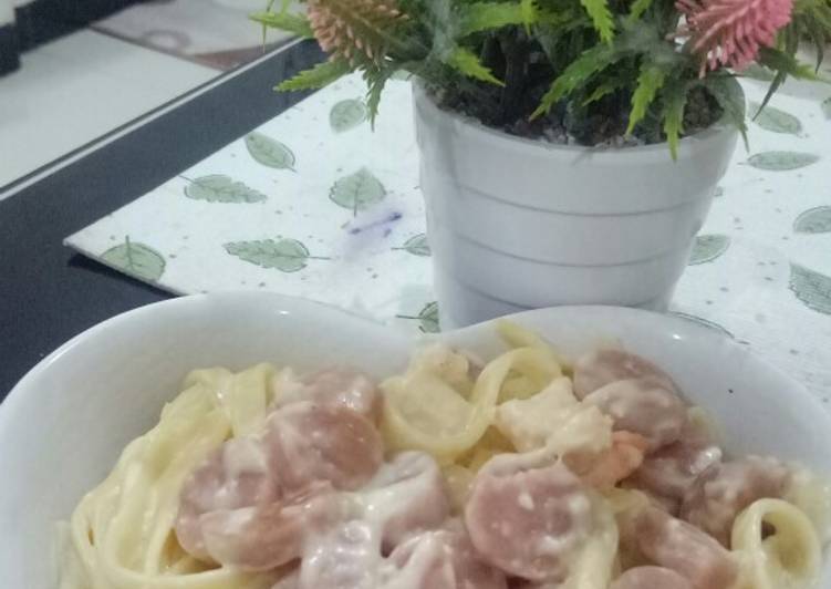 Fettucini carbonara with sausage and shrimp