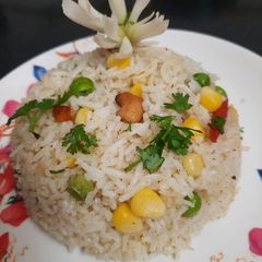 A picture of Corn green peas pulao.