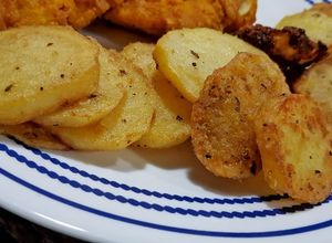 Una foto de Papitas redondas fritas
