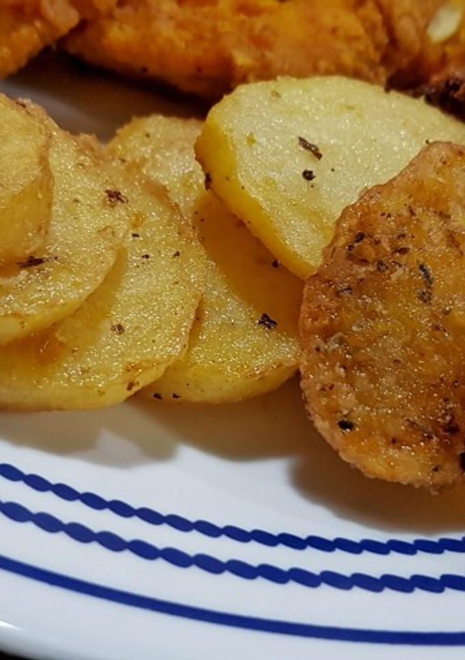 Una foto de Papitas redondas fritas