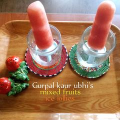 A picture of Mixed fruits ice lollies/ popsicles🍉🍊🥭🍒.