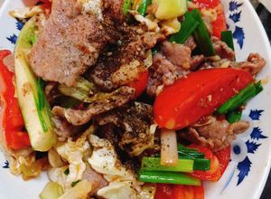 Hình của món Bò xào cà chua bắp cải.