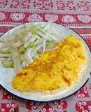 Omelette, zafferano, formaggio spalmabile e peperoncino in polvere