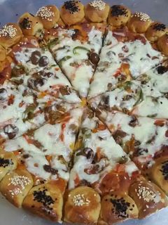صورة لوصفة بيتزا 😋