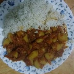 A picture of Boiled Rice with Stewed Potatoes.
