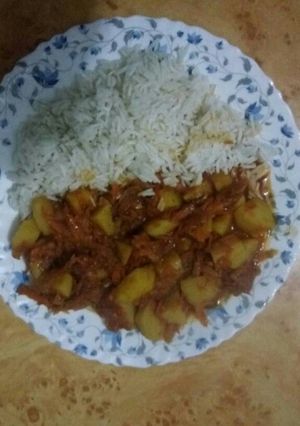 A picture of Boiled Rice with Stewed Potatoes.