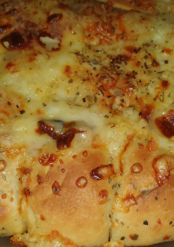 A picture of Pull a part Bread stuffed with Qeema.