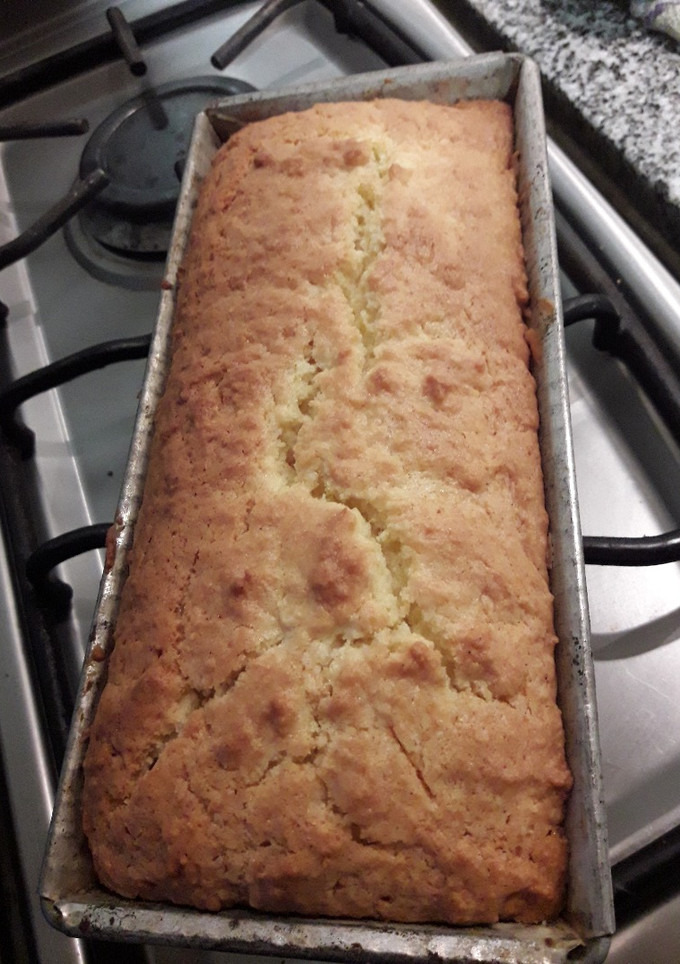 Una foto de Budín de coco y dulce de leche