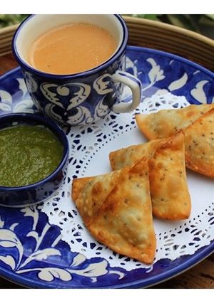A picture of Potato Stuffed Samosas & Green Mango Chutney.