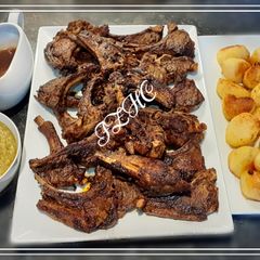 A picture of 🌿🥩🍋Greek Style Lamb Chops with Lemon and Thyme🌿🥩🍋.