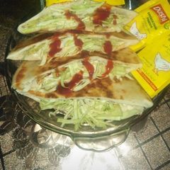 A picture of #Pita with chicken sandwich.
