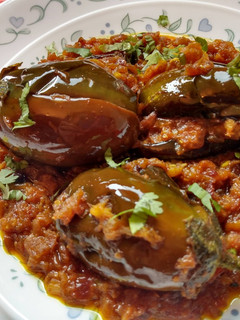 A picture of Stuffed Spicy Baby Eggplants.
