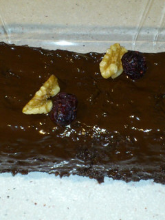 Una foto de Tarta de chocolate y nueces, sin harina (microondas)