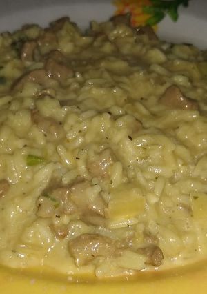 Una foto de Arroz con crema y carne