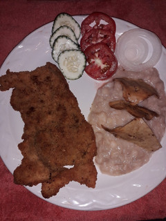 Una foto de Milanesa de cerdo bien zasonada
