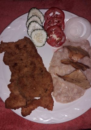 Una foto de Milanesa de cerdo bien zasonada