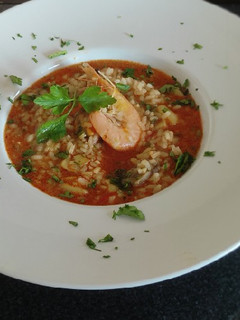 Una foto de Arroz caldoso con rape y marisco