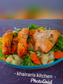 Stir fry garlic vegetables and salmon fish ainihin hoton girkin