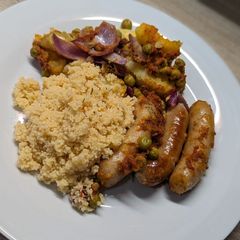 A picture of Delicious Crushed Potato and Sausage Traybake.