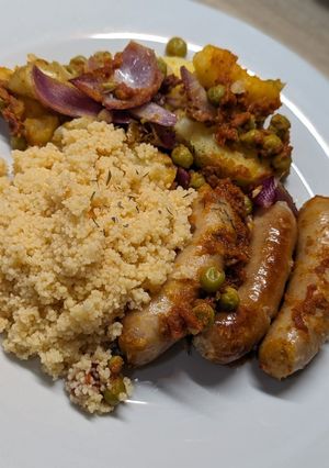 A picture of Delicious Crushed Potato and Sausage Traybake.