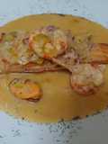 Salmón en salsa de naranja y marisco
