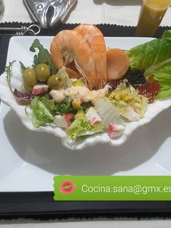 Una foto de Concha de ensalada de mar