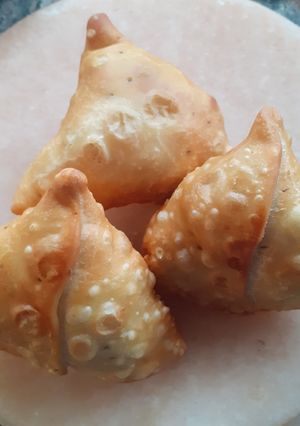 A picture of Whole wheat flour Samosa with paneer filling.