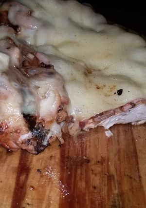 Una foto de Pollo a la pizza