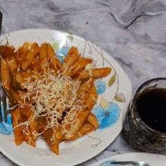 A picture of Tomatoes Cheese pasta.