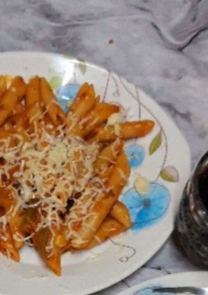 A picture of Tomatoes Cheese pasta.