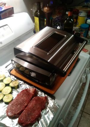 A picture of Electric smokeless grill.