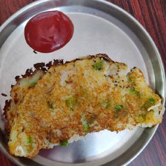 A picture of Rava chila with vegetables for kids.