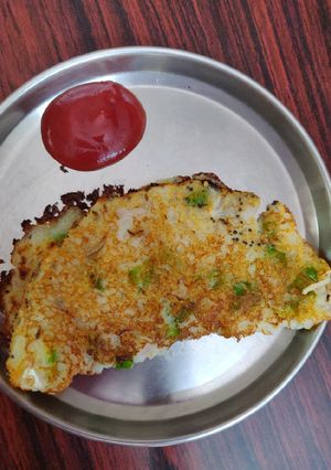 A picture of Rava chila with vegetables for kids.