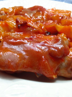 Una foto de Pies de cerdo con tomate
