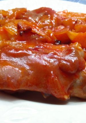 Una foto de Pies de cerdo con tomate