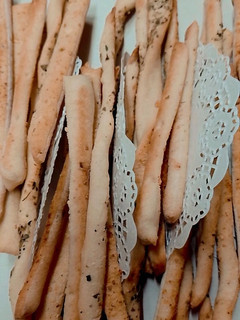 Una foto de Grisines de queso rallado y orégano