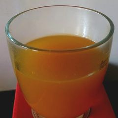 A picture of Turmeric Tea with Ginger and Hearbs.