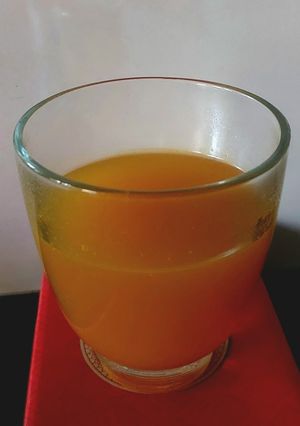 A picture of Turmeric Tea with Ginger and Hearbs.