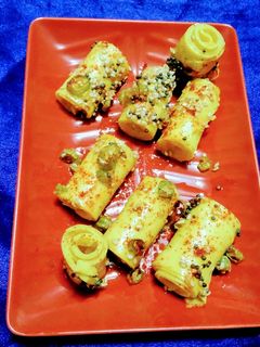 ખાંડવી (Khandvi Recipe In Gujarati) રેસીપી મુખ્ય ફોટો