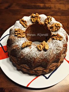 صورة لوصفة كيكة الهيل والجوز - cardamom-walnut cake