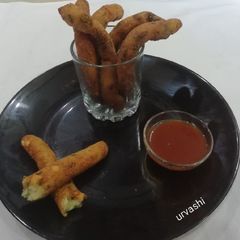 A picture of Raw banana cheesy fingers.