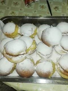Una foto de Ricos berlines horneados para la once ❤️