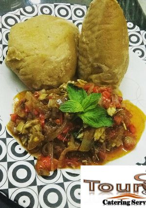 A picture of Moi-moi with onion sauce.