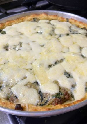 Una foto de Tarta base de papa y relleno con acelga